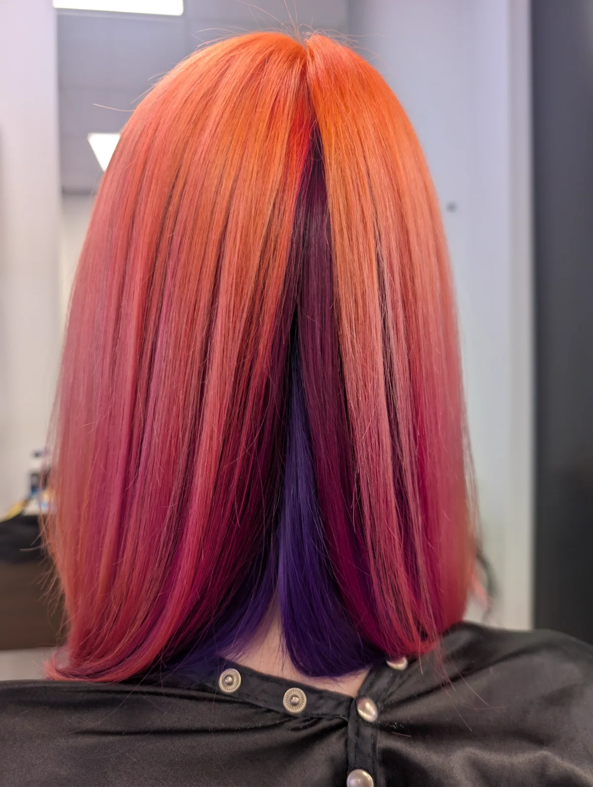 Kleurwerk van Patricia: oranje en rood haar met een paarse onderlaag
